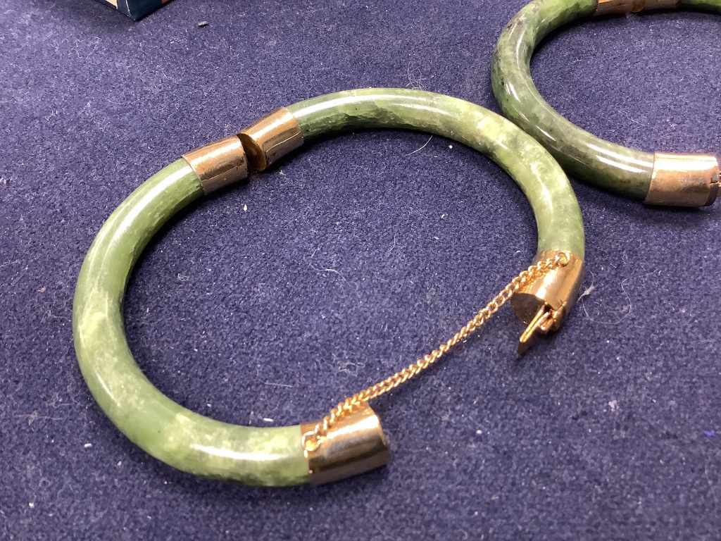 A Chinese jadeite pendant , a pair of bangles, earrings and a cricket pendant